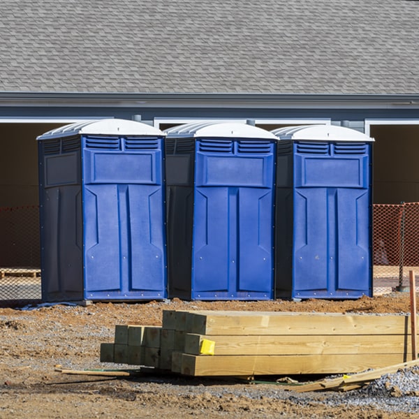 what is the cost difference between standard and deluxe porta potty rentals in Gray Summit